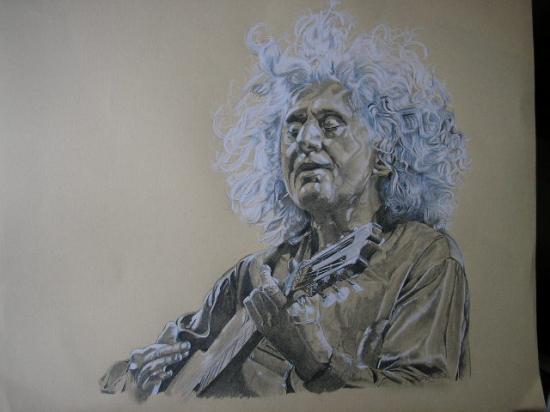 Angelo à la guitare.